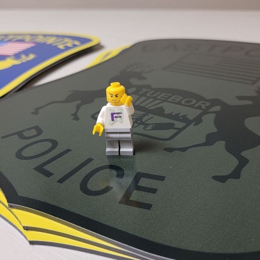 Lego Greg with a police sign